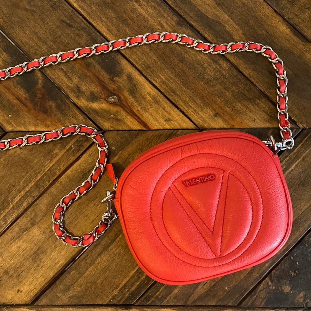 Valentino clutch with detachable red chain